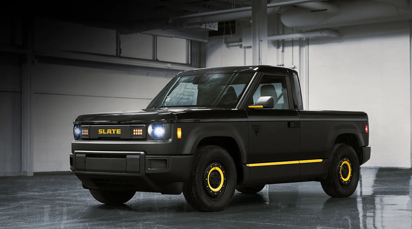 Black and yellow Slate truck in garage