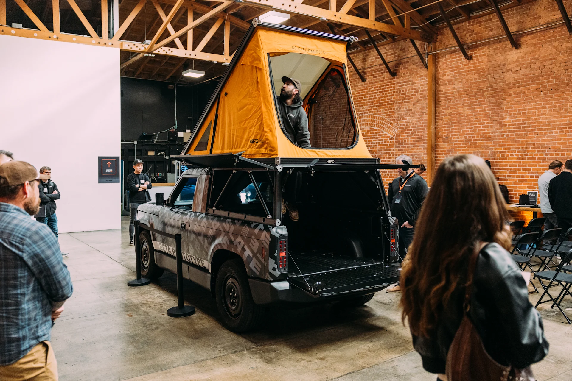 People gathered around the Slate Truck at maker event.