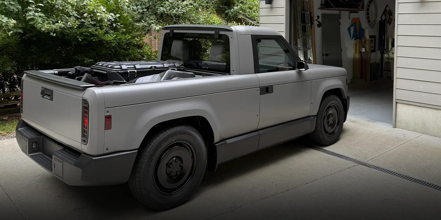 Josh and team with the frunk open