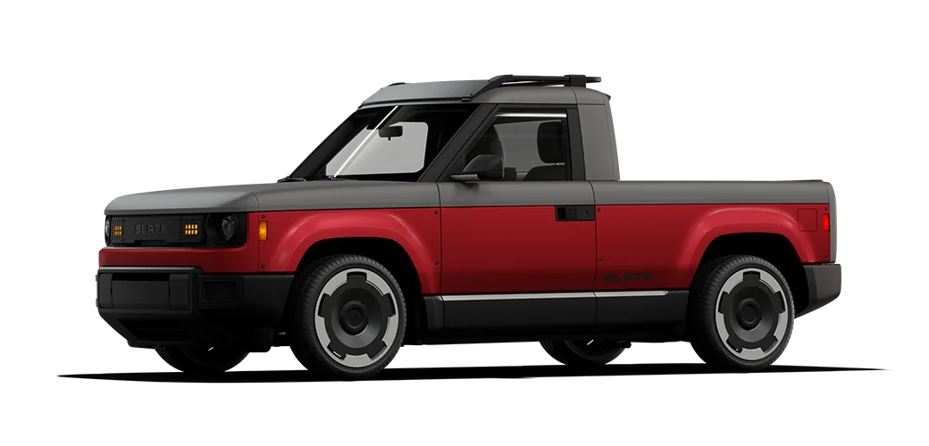 Slate Truck with red partial wrap, accessory wheels, and a roof rack.
