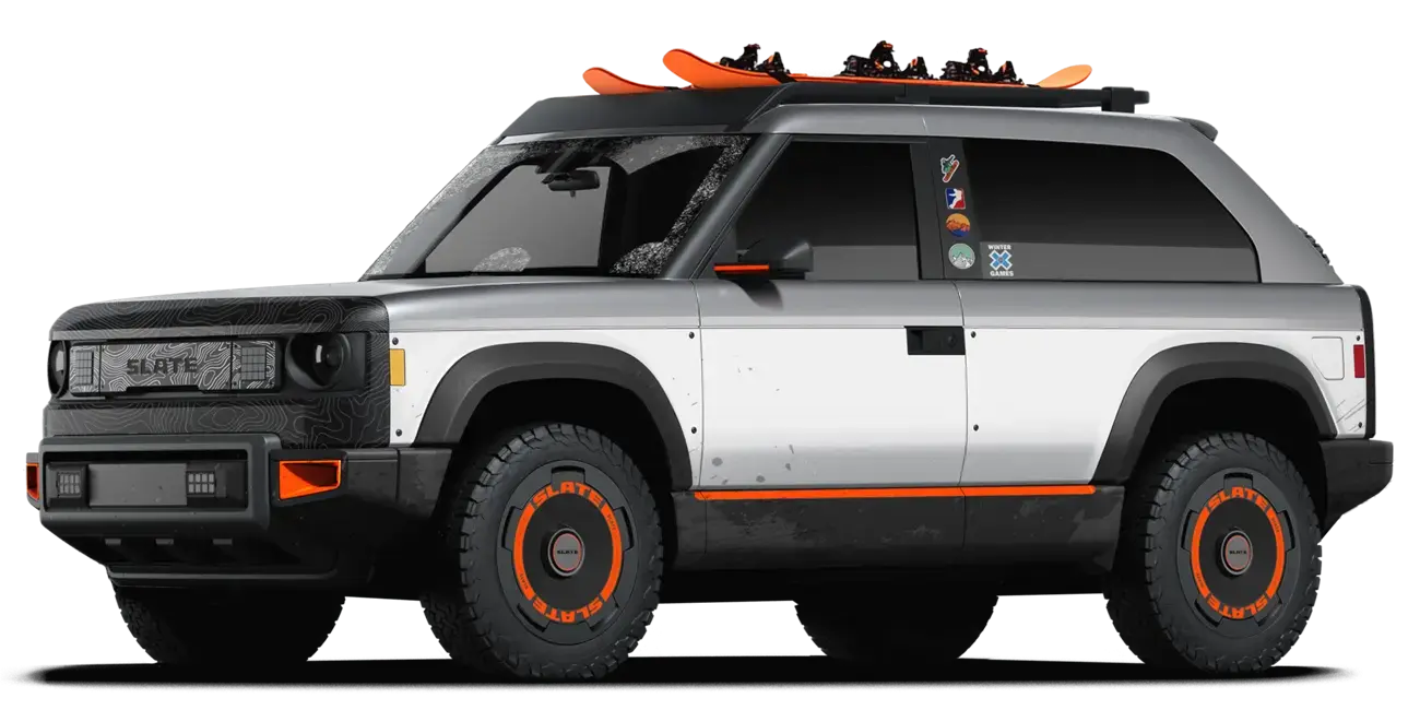 silver SUV fastback with snowboards
