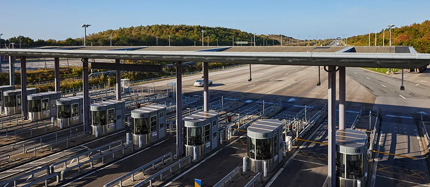 The Øresund bridge toll station on a sunny day in the direction of Denmark.