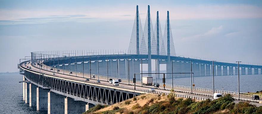 The Øresund Bridge on a summer day with traffic.