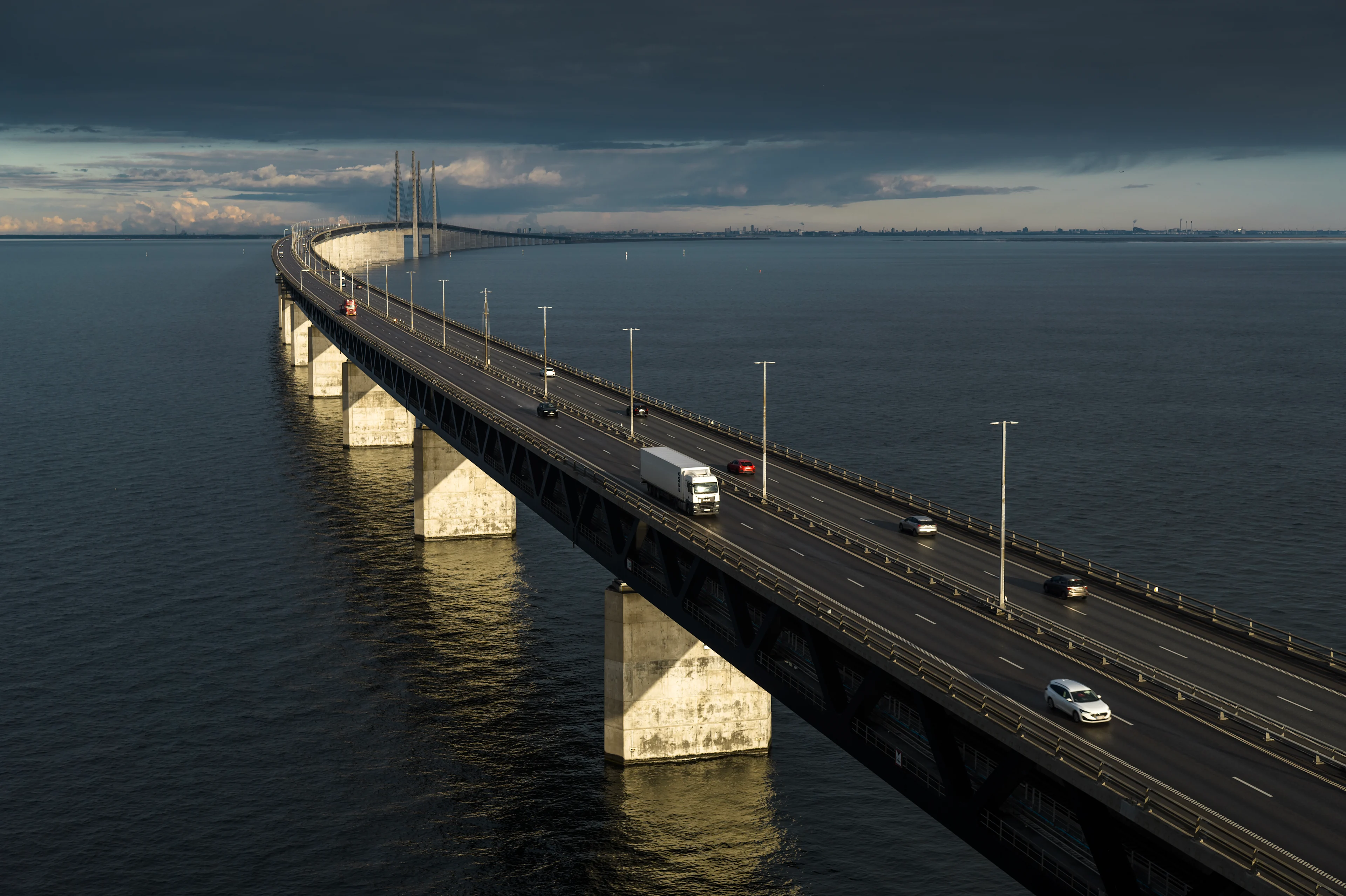 The Øresund Bridge seen from the air in dark weather.