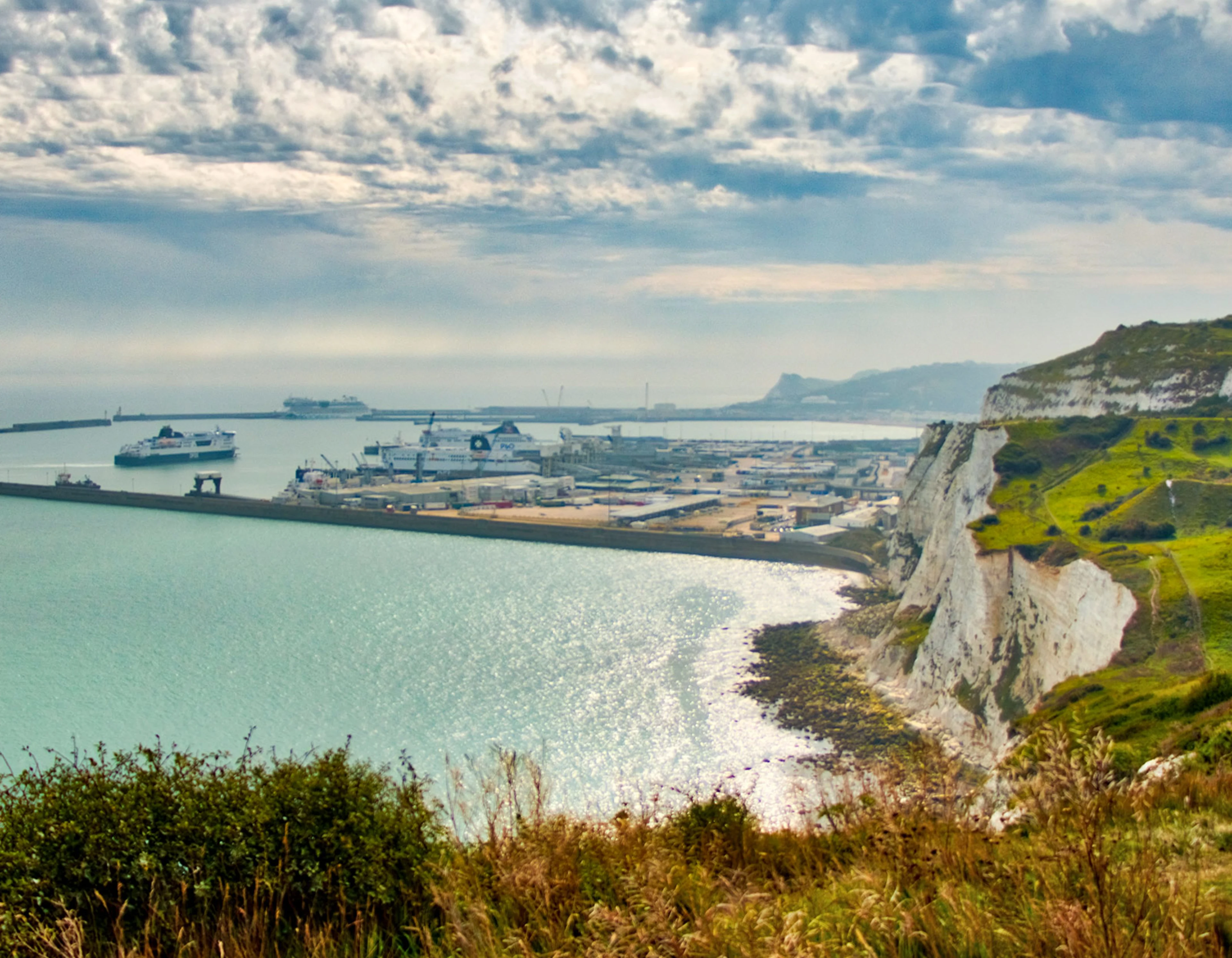 Ship in Harbour in Dover, Sea to the left, white cliffs to the right.