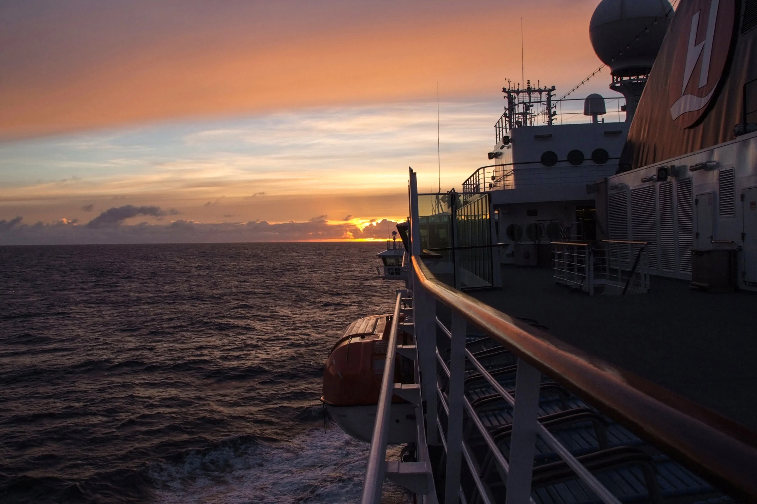 MS Fram during sun set passing Denmark Strait.