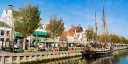 Wooden sailboat in Noorderhaven canal, Harlingen, Netherlands