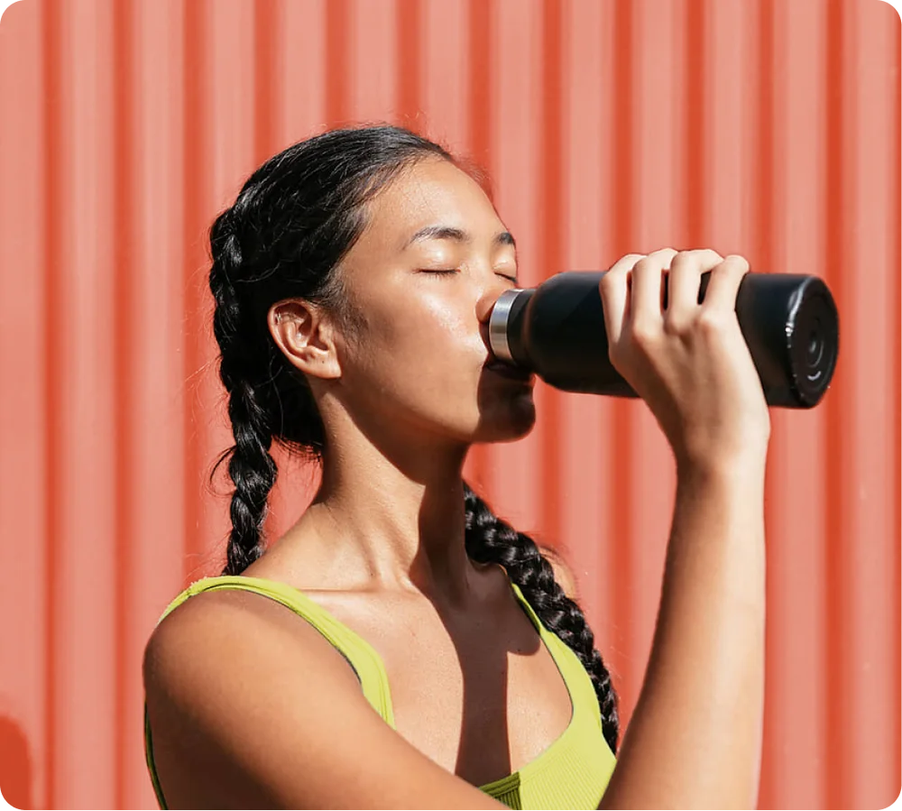 Girl taking water