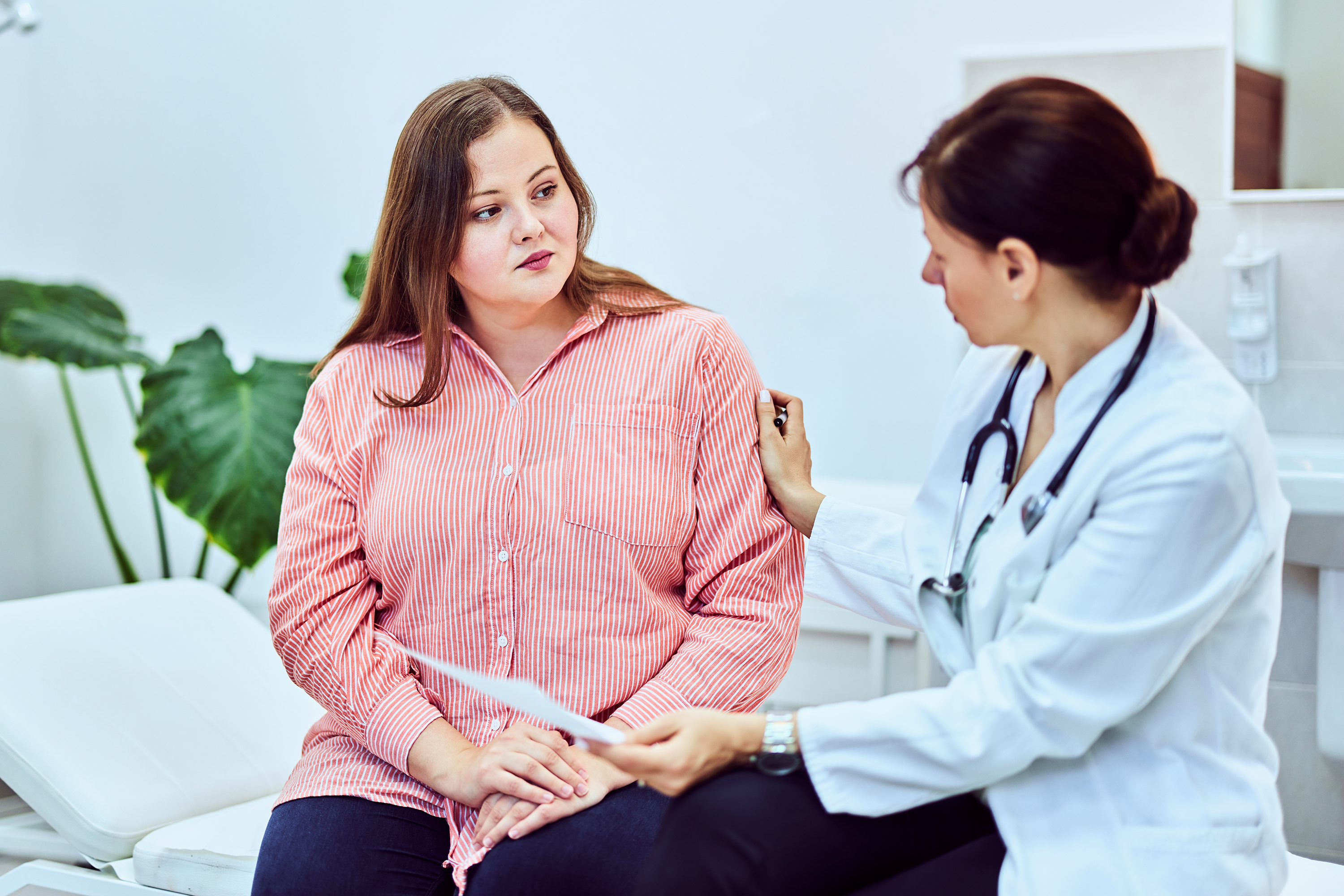 Doctor consulting with a patient in a medical office
