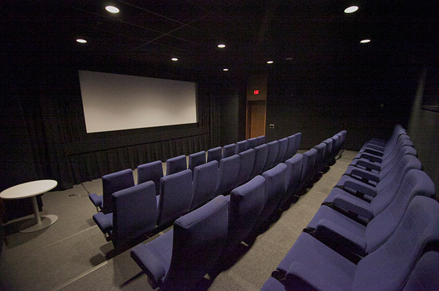 Interior shot of Cinema 6 with rows of empty seats