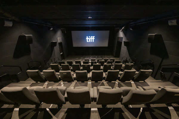 Interior shot of Cinema 5 with rows of empty seats