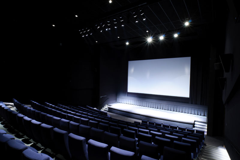 Interior shot of Cinema 3 with rows of empty seats