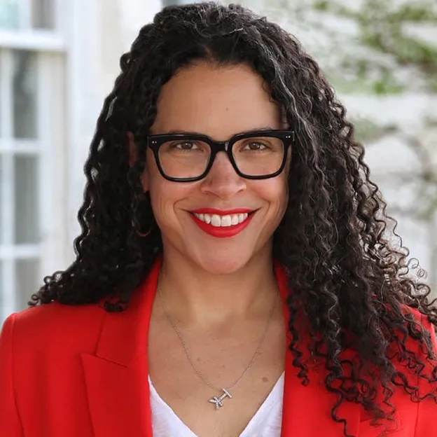 Headshot of Lacey Schwartz Delgado