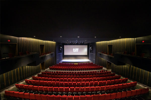 Interior shot of Viola Desmond Cinema with rows of empty red seats