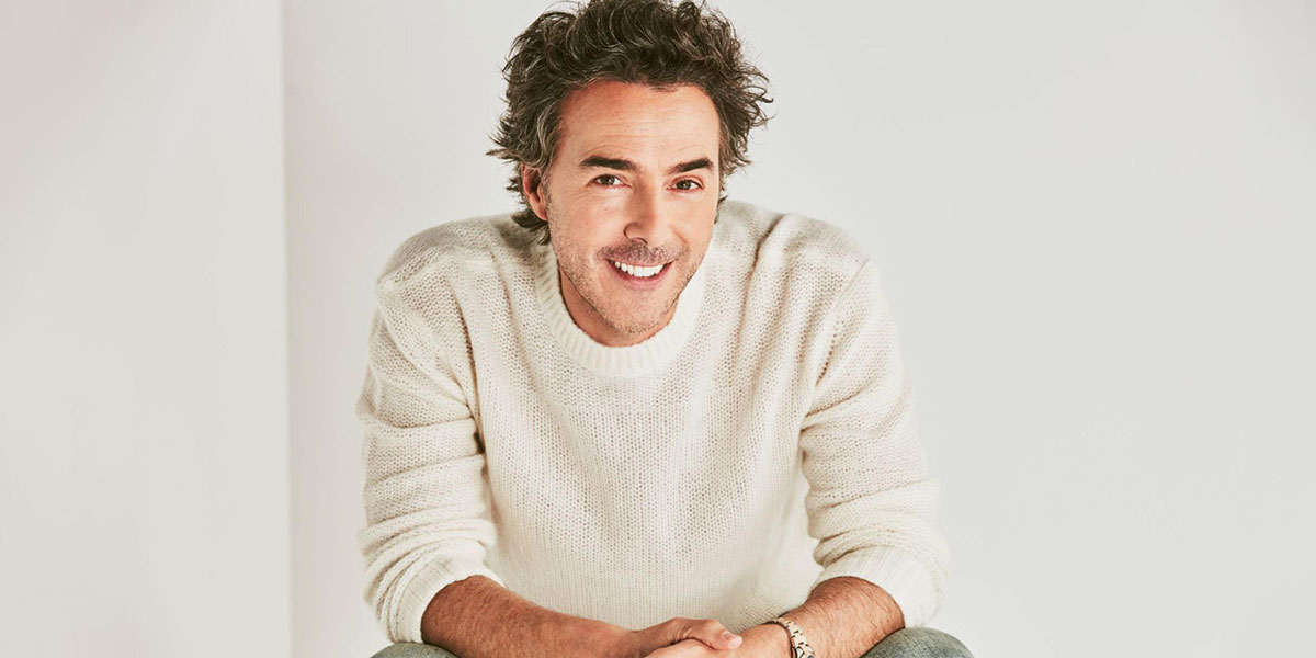 Candid portrait of director Shawn Levy against a white backdrop