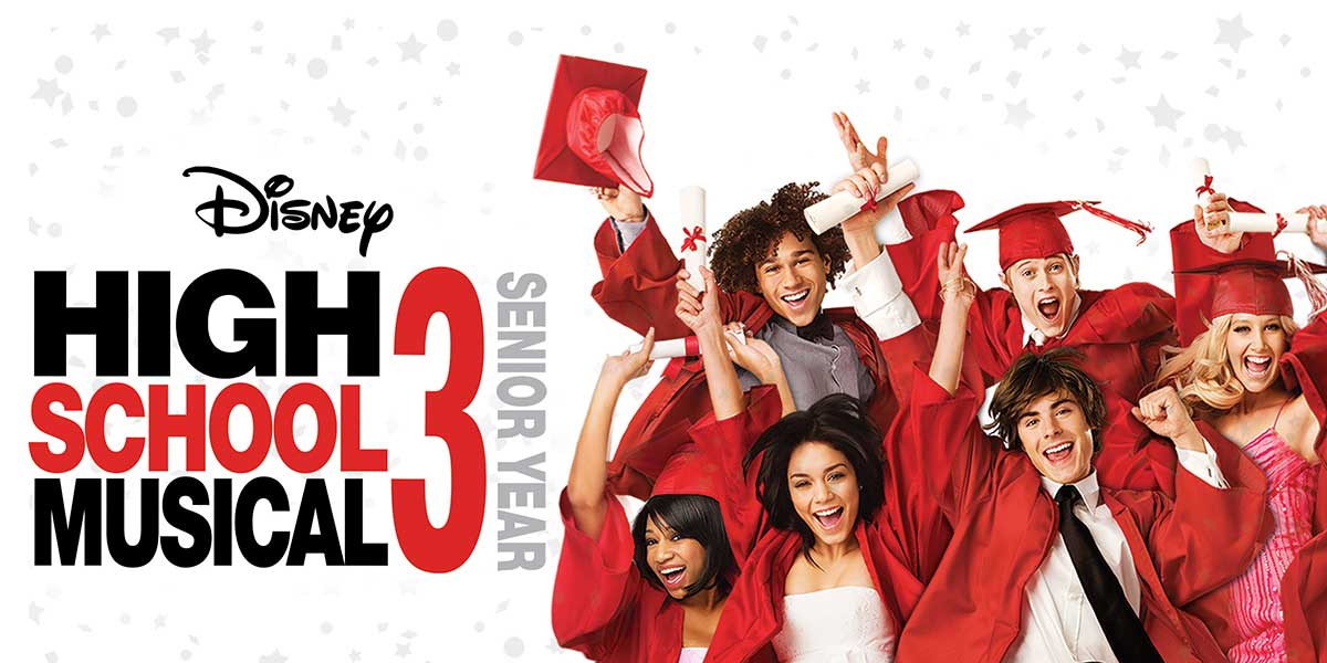 Excited graduates in red caps and gowns jumping with Disney High School Musical 3 Senior Year logo