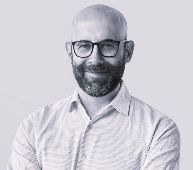 A headshot of David Oppenheim