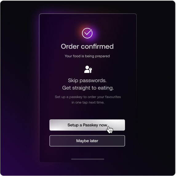 Mobile application prompting a user to enroll a biometric passkey immediately following a successful purchase.