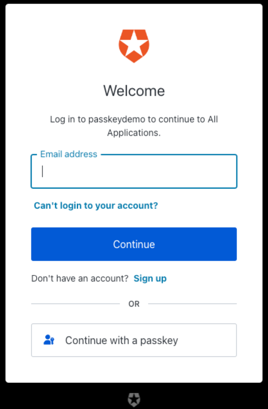 Universal Login box featuring both email address text field and “Continue with a passkey” button