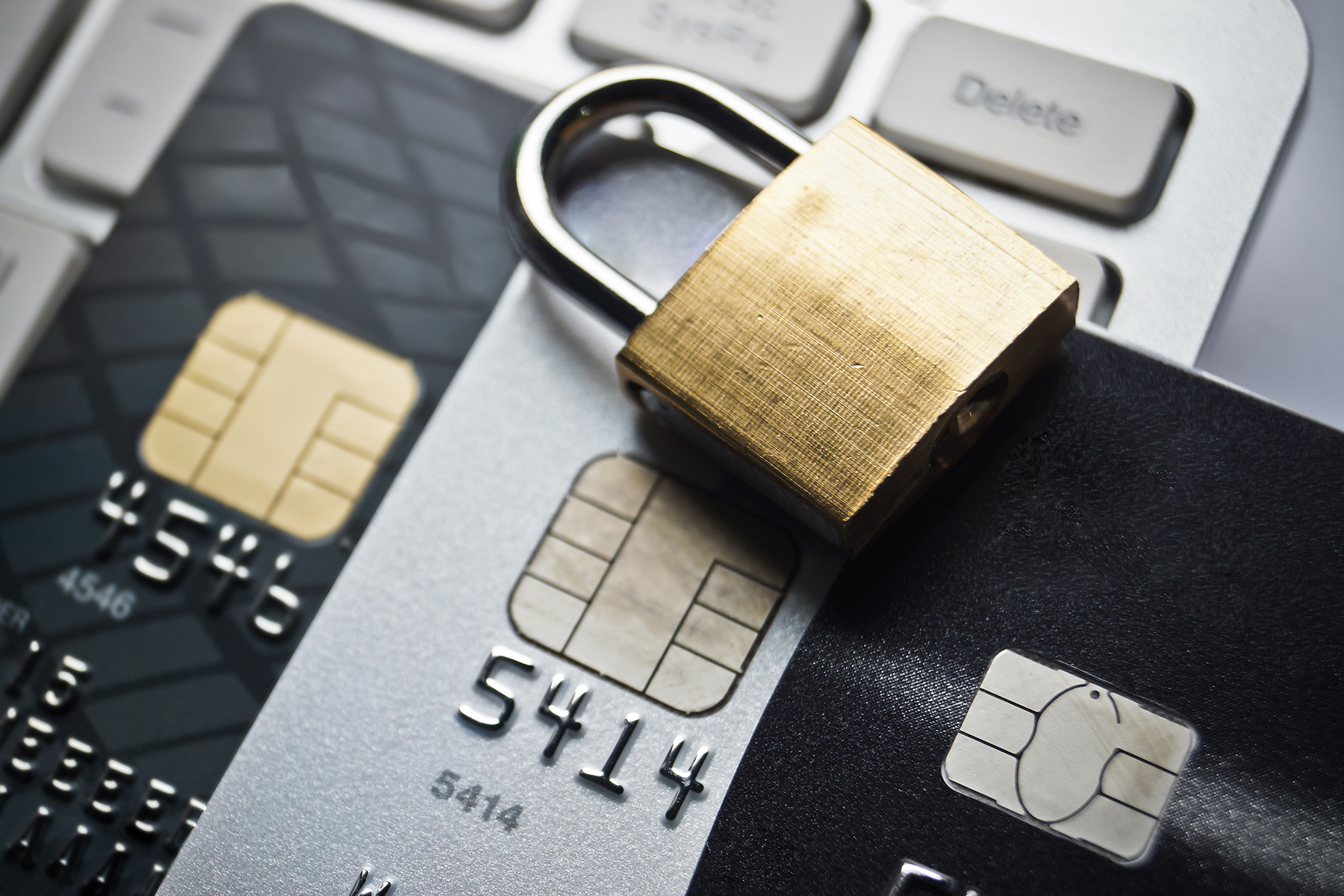 Image of a credit card secured by a lock