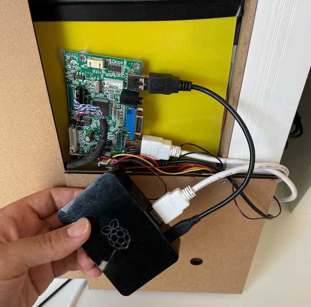 Picture of a Raspberry Pi connected to the two way mirror