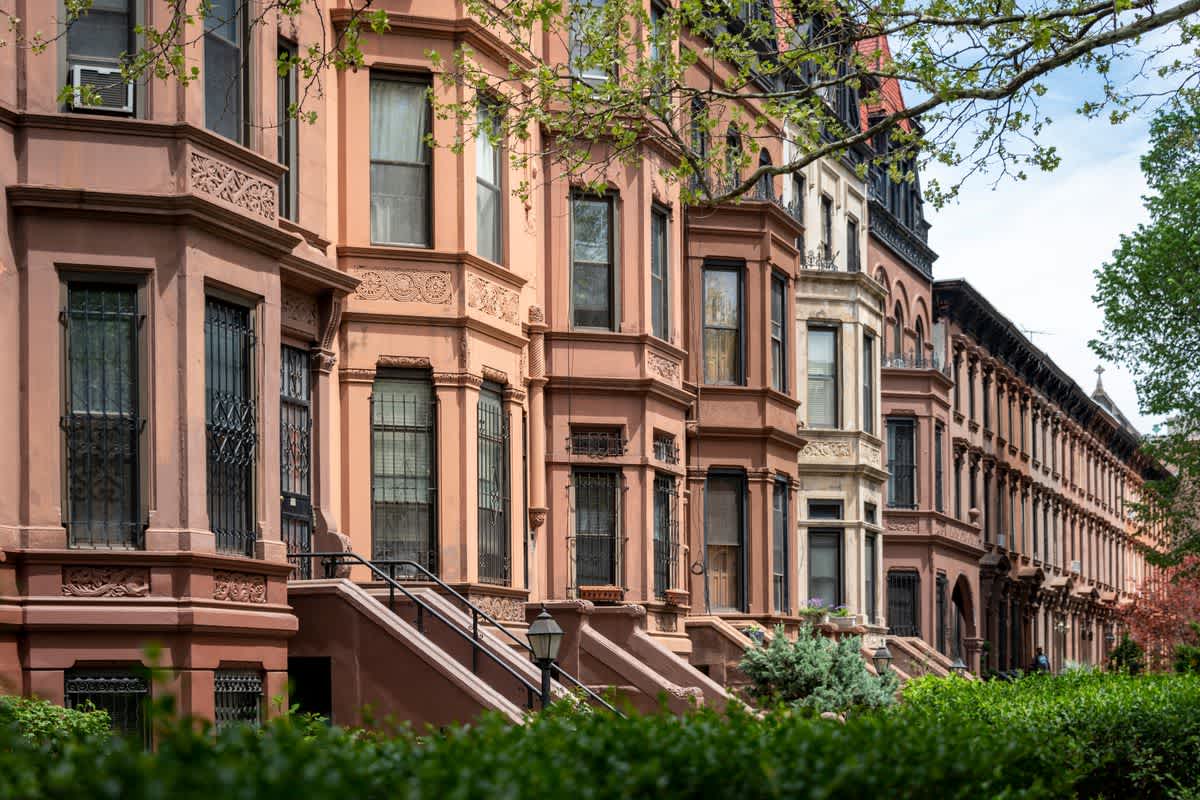 Brownstone row houses - shutterstock 1129161986.0