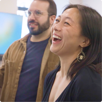 Grow team members smiling together.