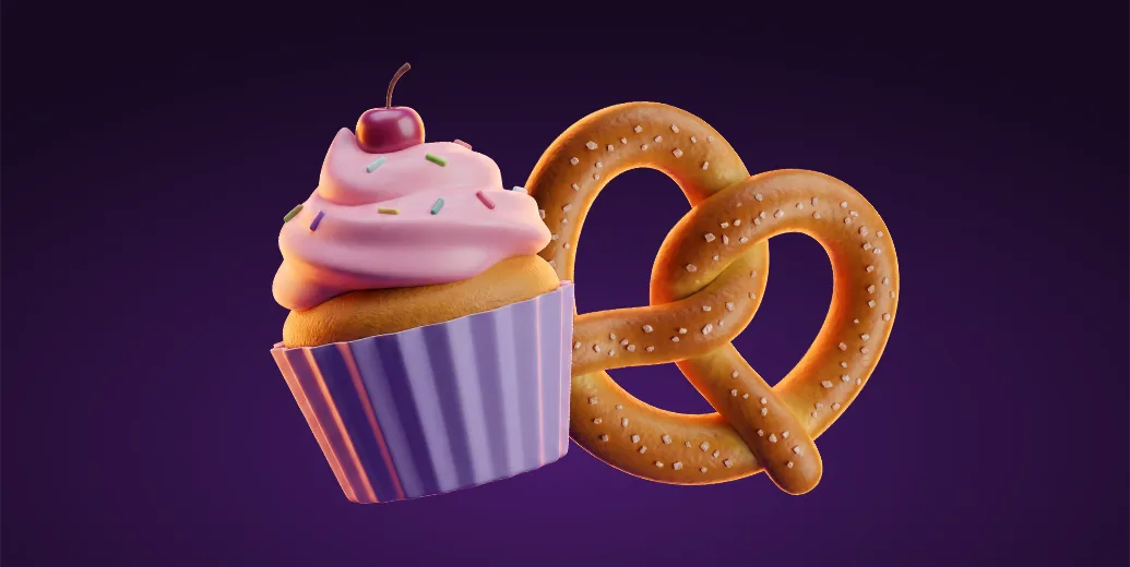 Pink frosted cupcake with a cherry and sprinkles next to a salted soft pretzel on a dark purple background, representing bakery treats delivered with Wolt for Halloween.