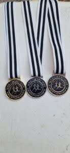 Gold in the U17 Javelin event, Silver in the U17 Discus, and Bronze in the U17 hammer event