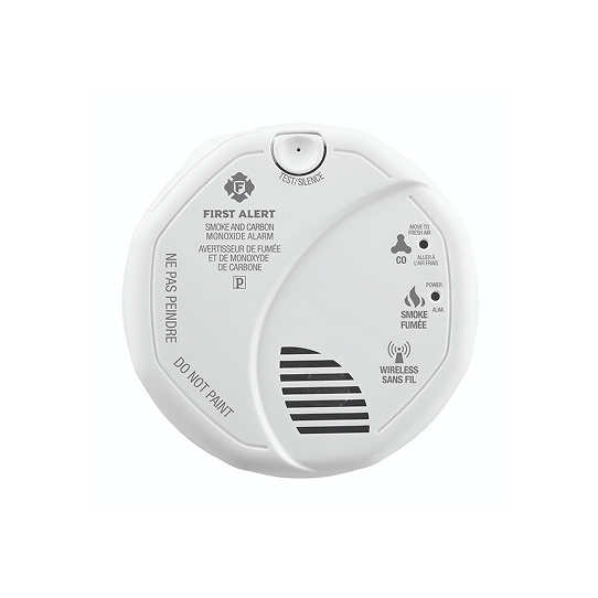 First Alert ZCOMBOA combination smoke and CO detector showing white circular design with test button and LED indicators