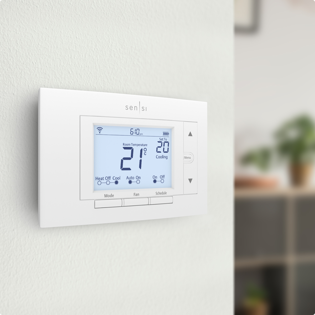 Un thermostat intelligent Wi-Fi Sensi sur le mur d’une maison.