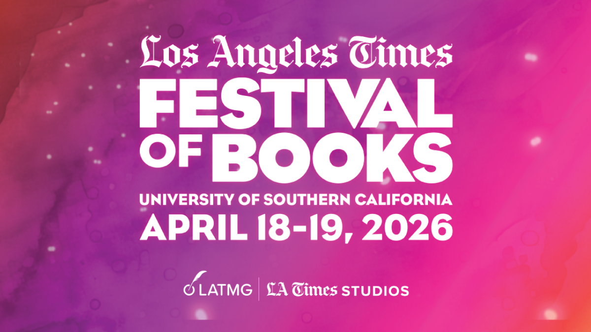 Festival-goers perusing books.