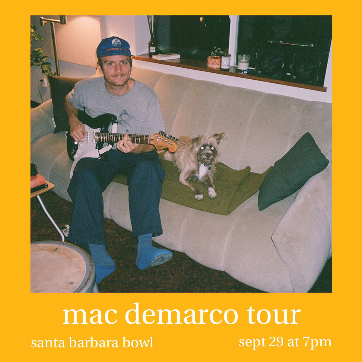 Person playing electric guitar on couch with small dog, Mac DeMarco tour poster for Santa Barbara Bowl, September 29 at 7pm.