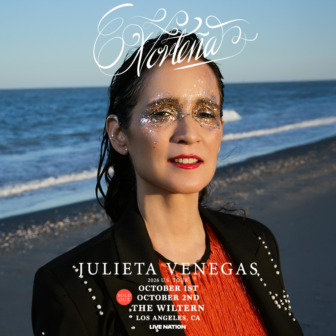 Julieta Venegas Norteña tour poster featuring her on a beach with glitter makeup, red lips, and a black jacket.