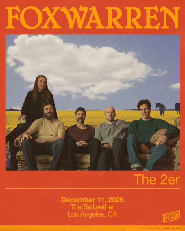 Music band Foxwarren album cover with members seated against yellow field backdrop, orange border displaying concert details.