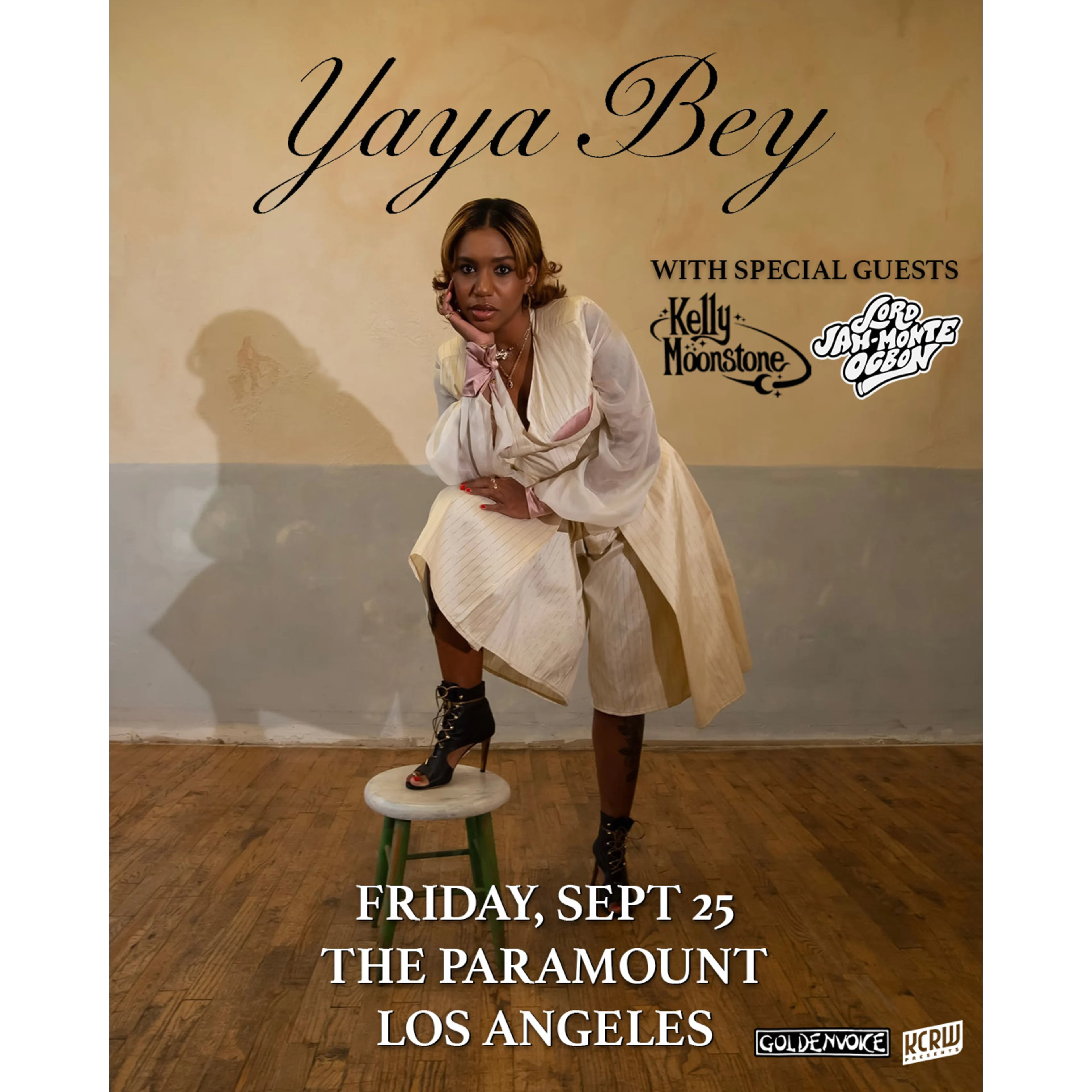 Yaya Bey concert poster featuring a woman in a white dress posing on a stool, promoting a show at The Paramount, Los Angeles.