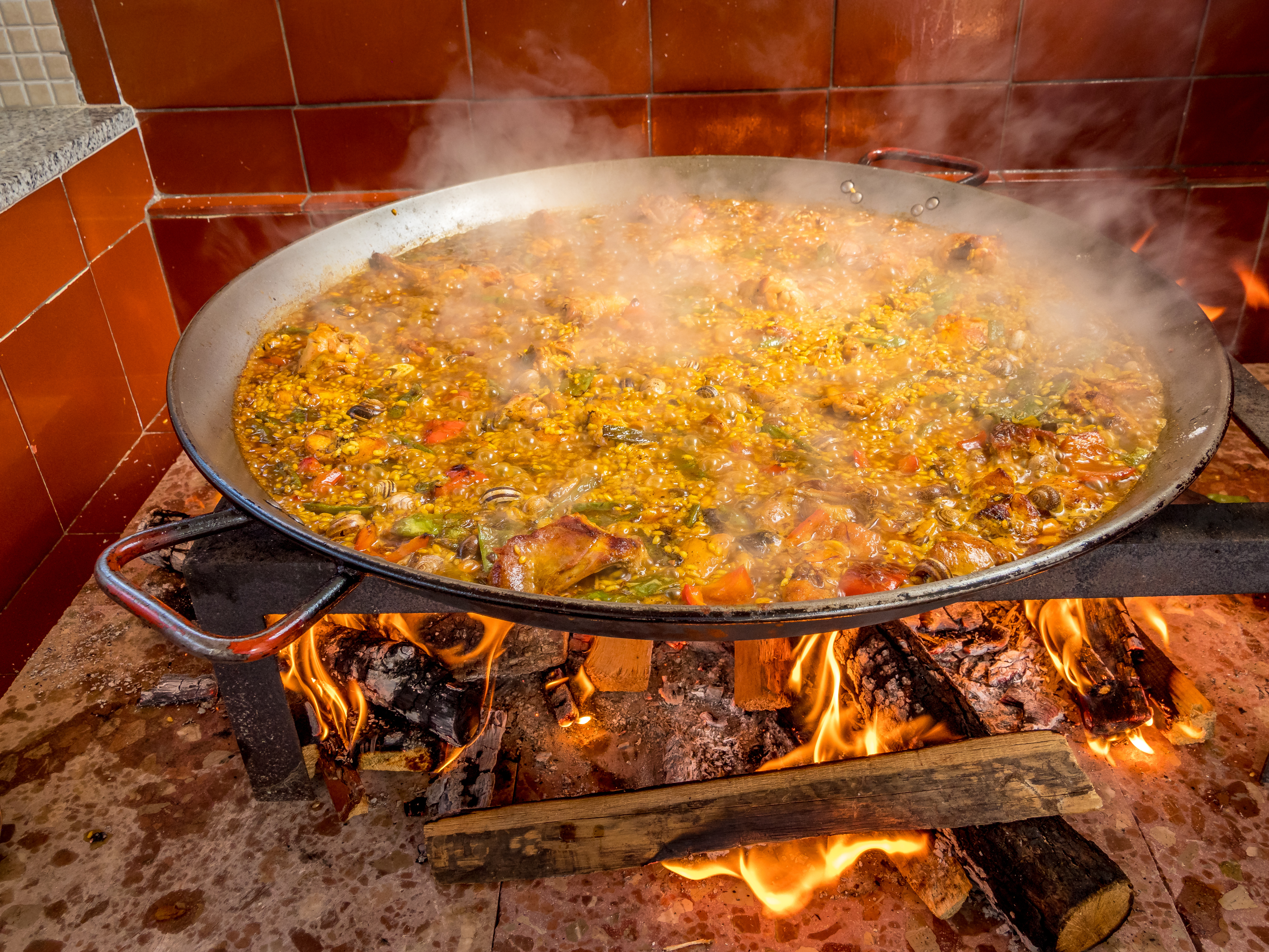 Paella — aka ‘rice with things’ — is perfect for… | KCRW