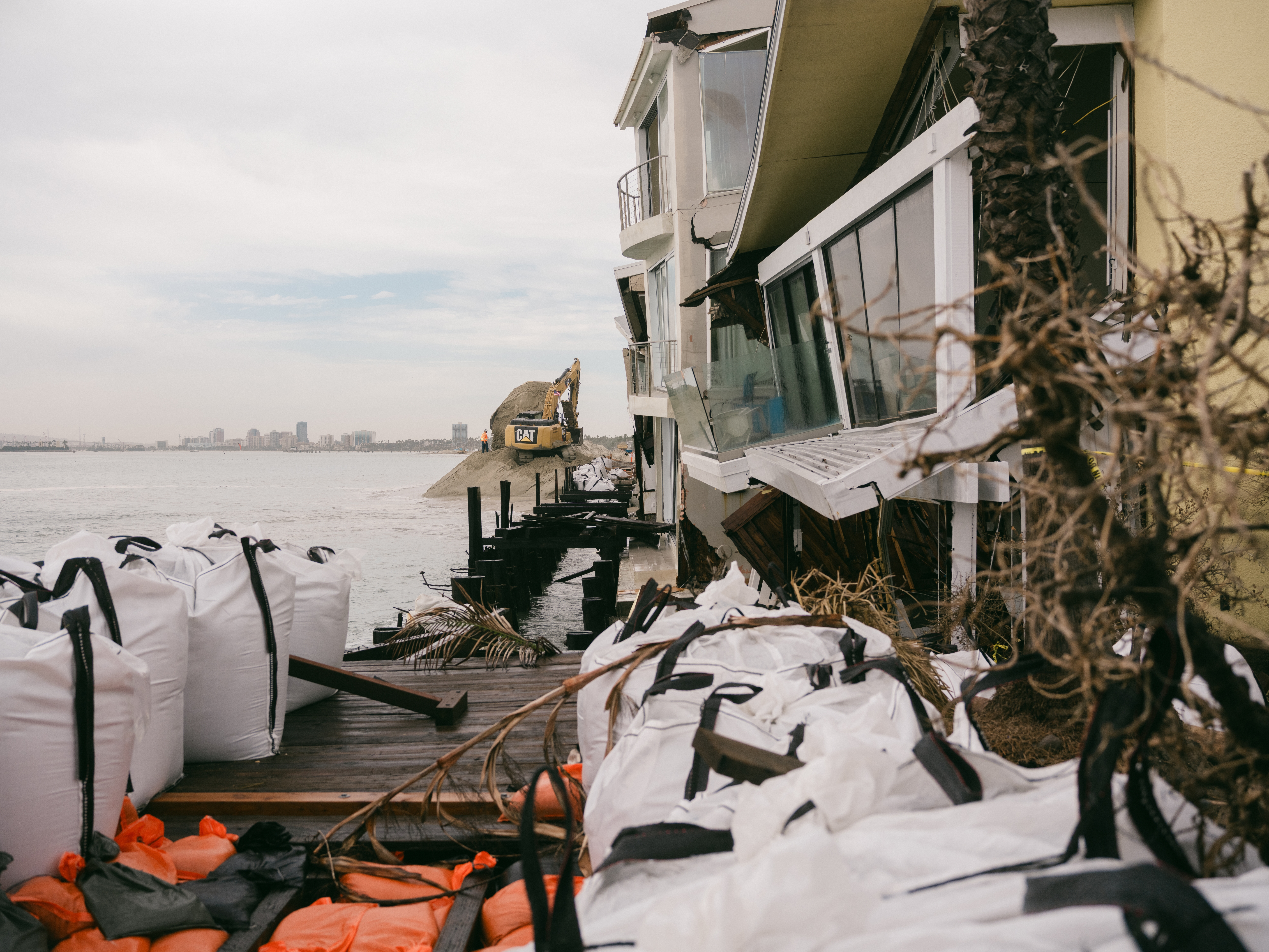 A home damaged by high surf along Long Beach's peninsula