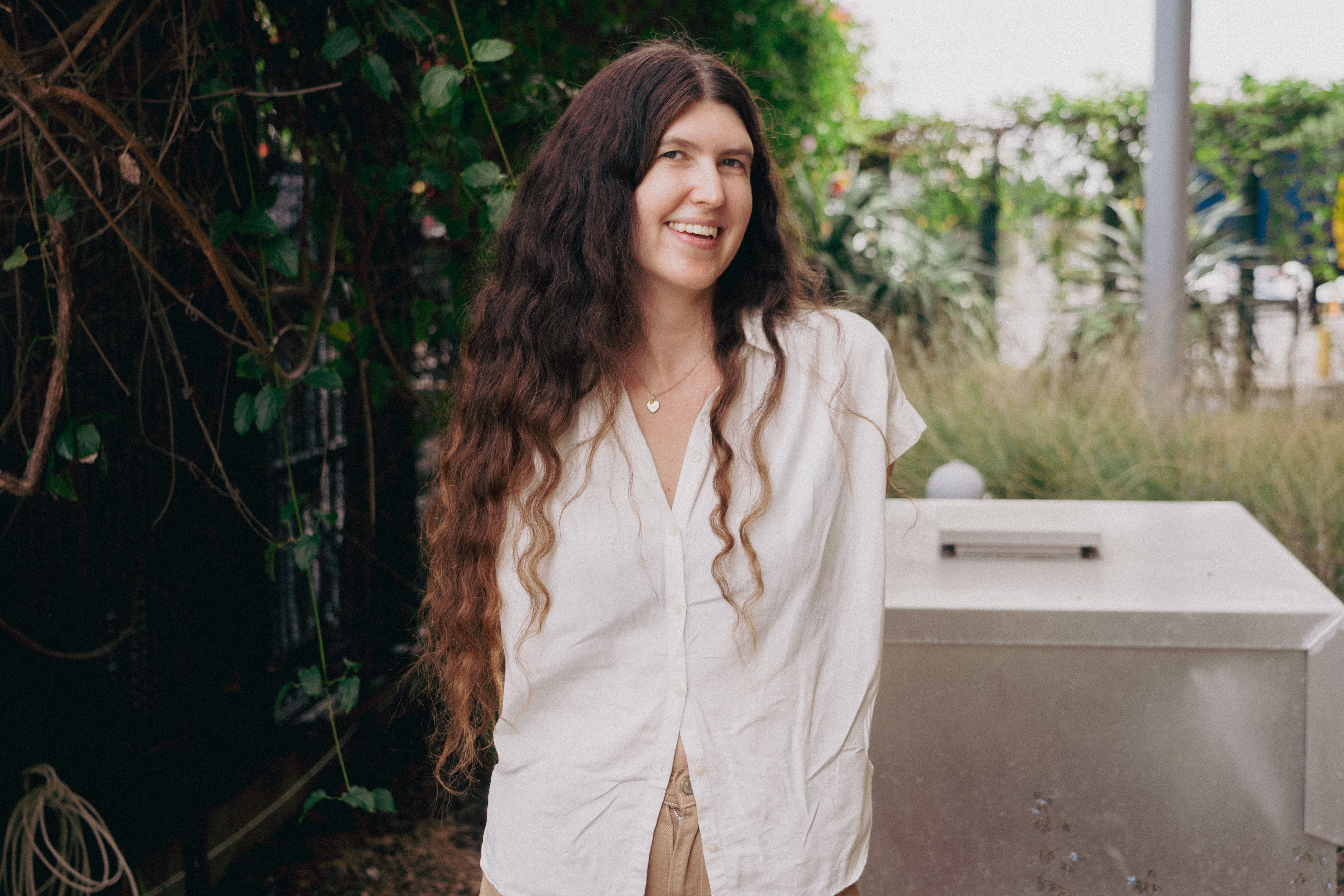Emily Beyda posing outside KCRW HQ