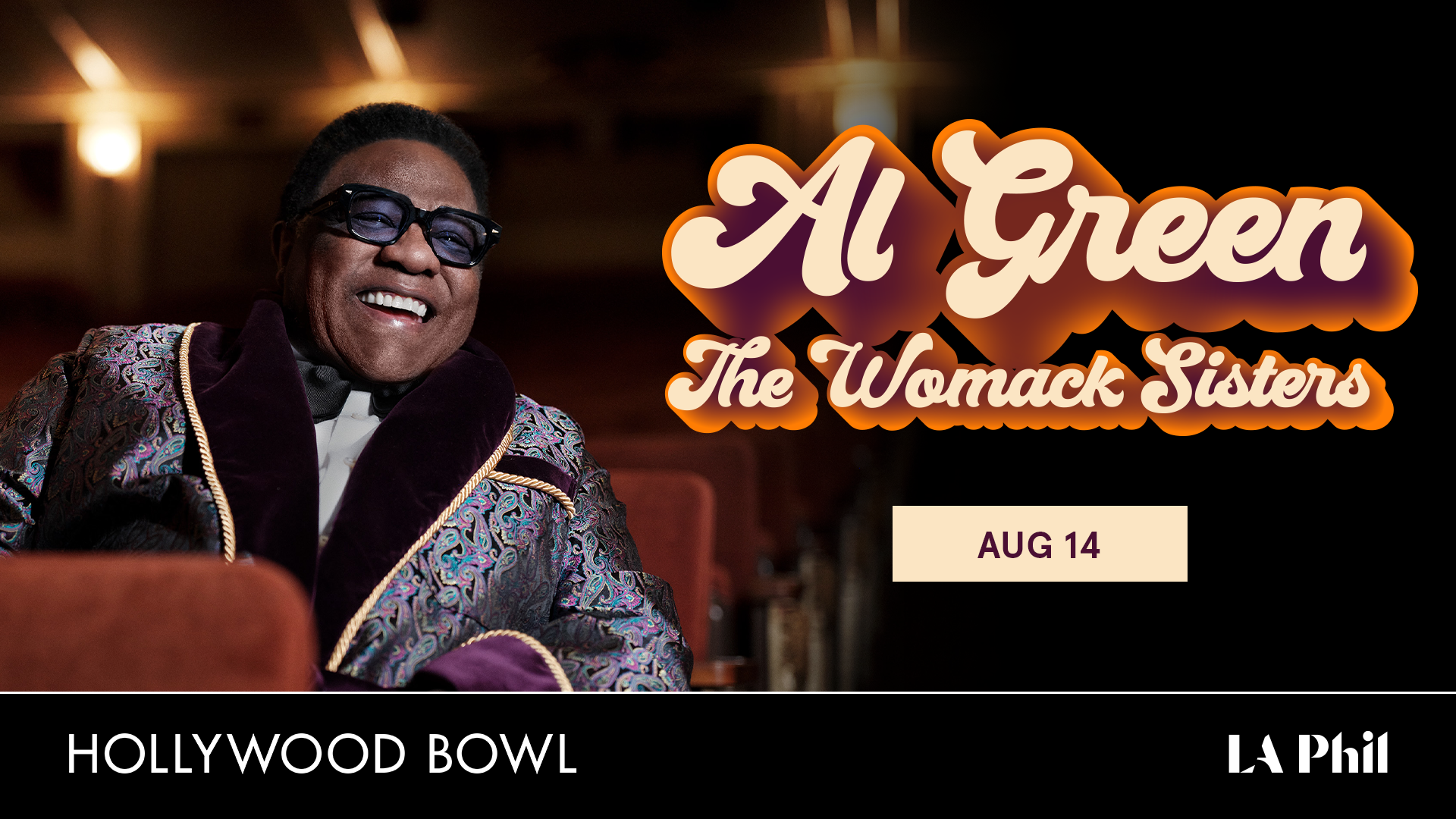 Al Green smiling in a colorful jacket and sunglasses, promoting his Hollywood Bowl concert with The Womack Sisters on Aug 14.