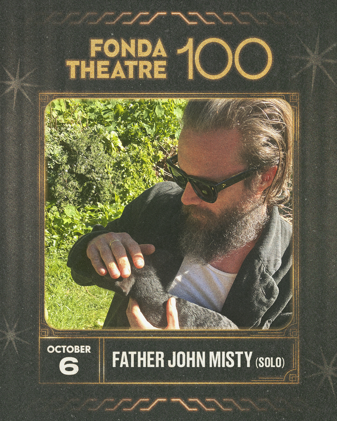 Father John Misty (Solo) performing at Fonda Theatre 100 on October 6; bearded man with sunglasses holds a small animal outdoors.