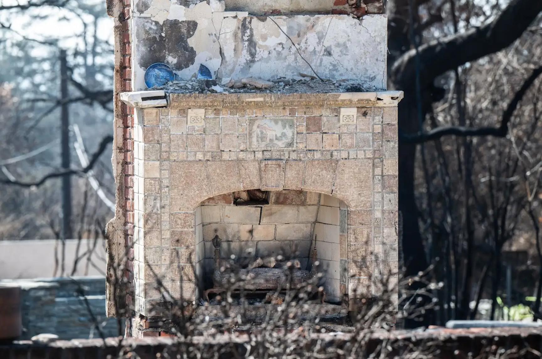 Volunteers recover historic fireplace tiles in Altadena | KCRW