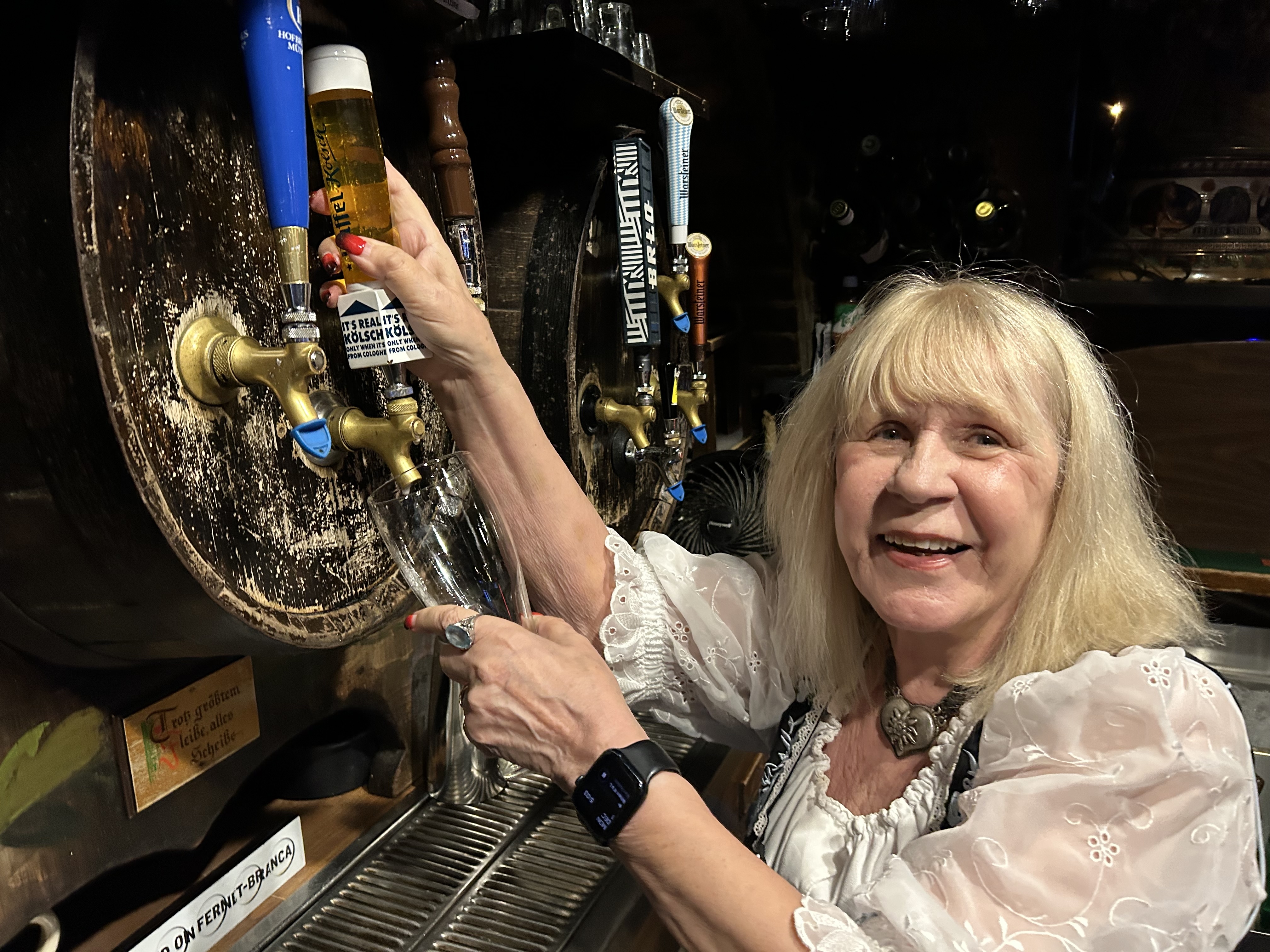 Elke Christopher pouring a beer at the Red Lion