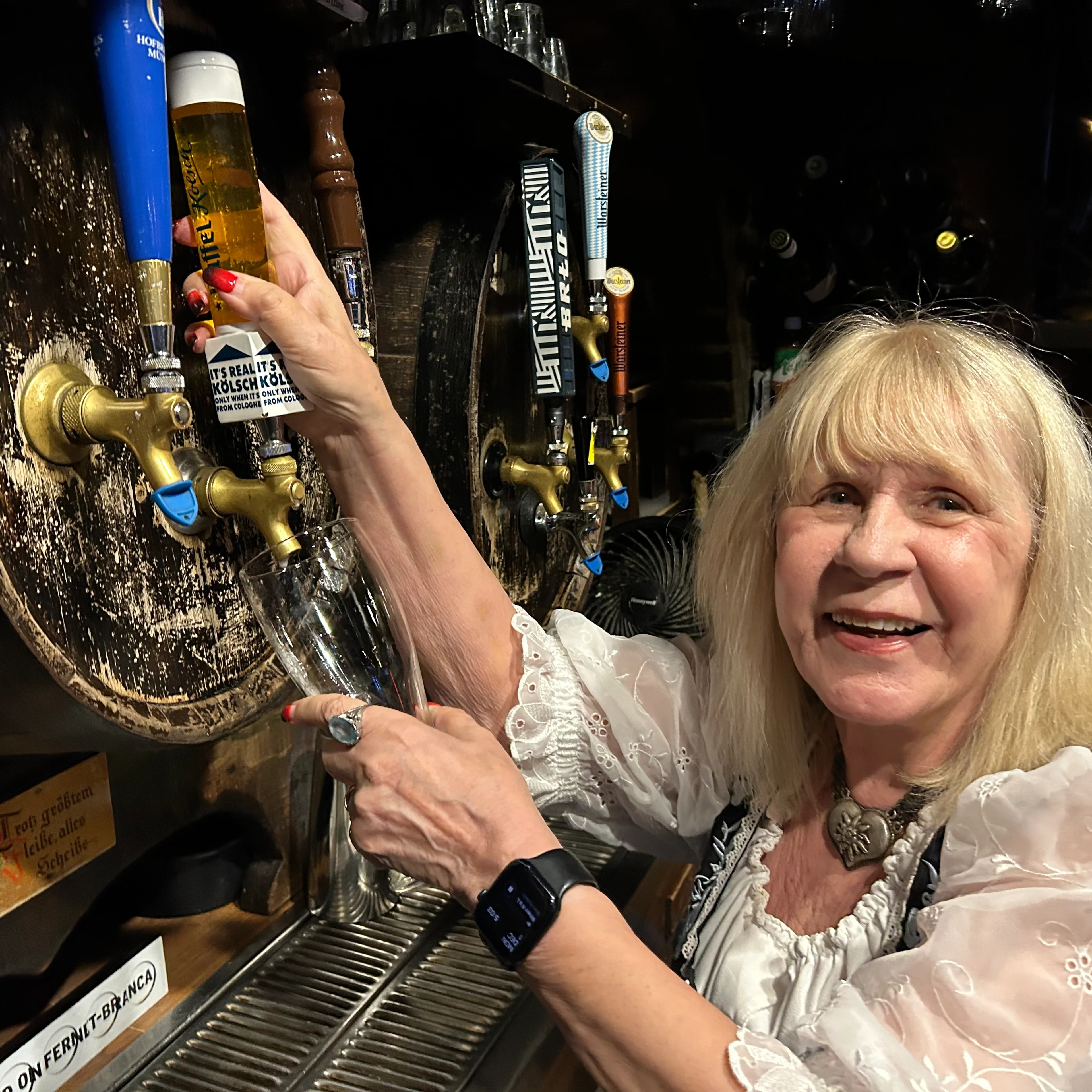 Elke Christopher pouring a beer at the Red Lion