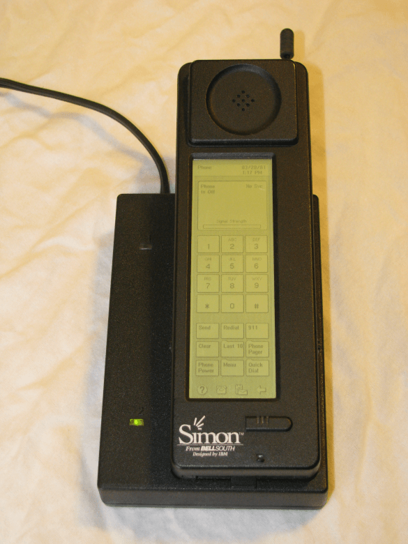Who invented the telephone - IBM SImon in charging station-585x780