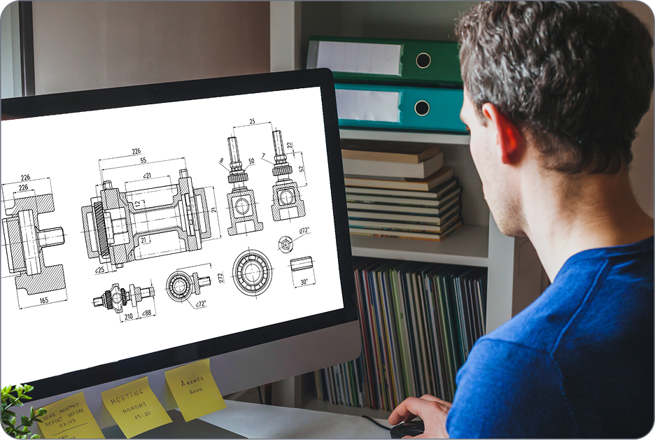 Man analyzing schematics - Visual Man analyzing schematics - Visual