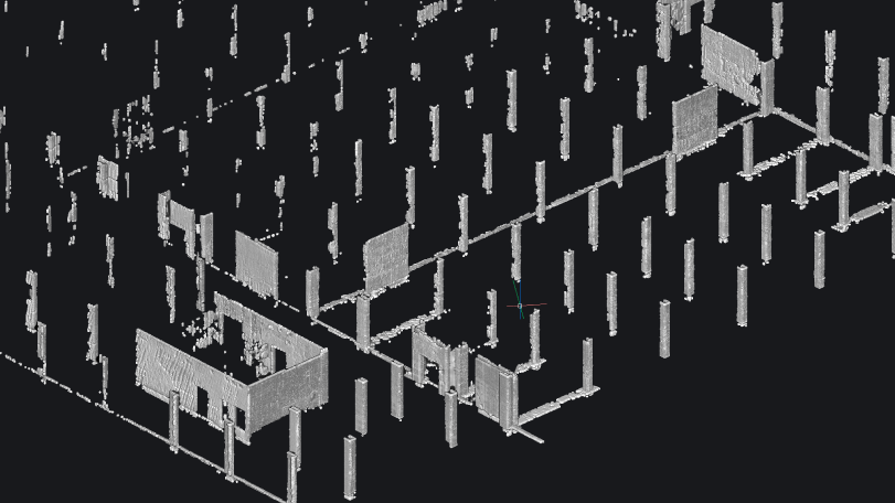 BricsCAD 3D point cloud scan of a building interior showing walls, columns, and room structures in isometric view.