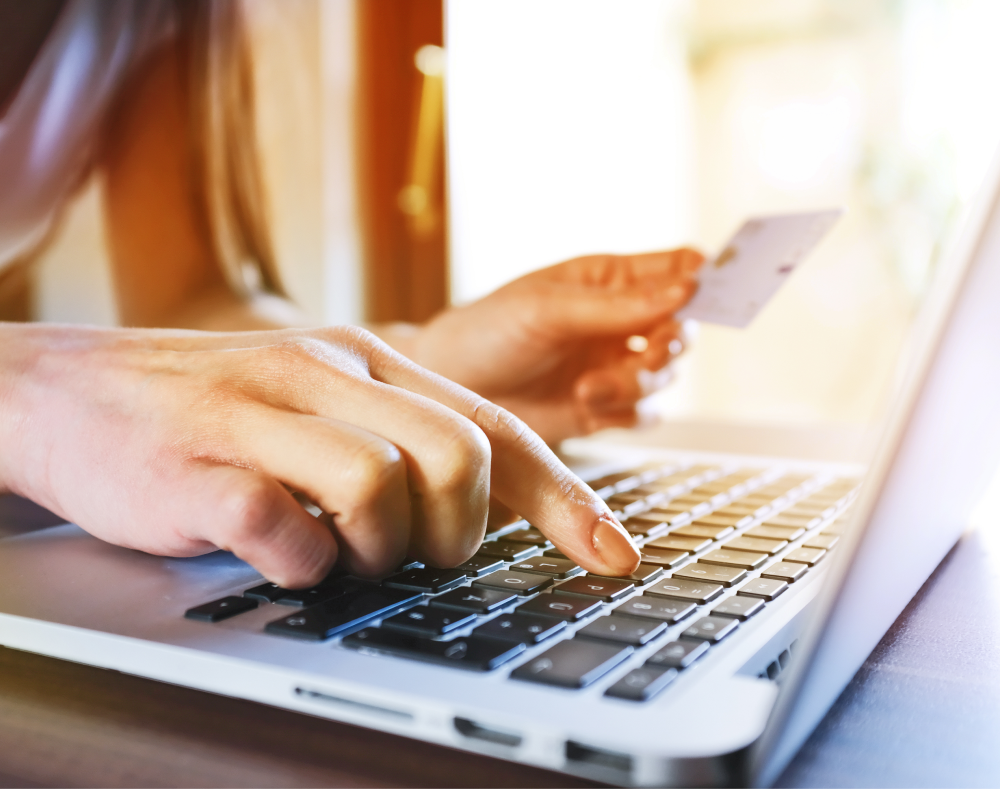 Woman shopping online on the internet on her laptop - AdobeStock_257619185 1.png Woman shopping online on the internet on her laptop - AdobeStock_257619185 1.png