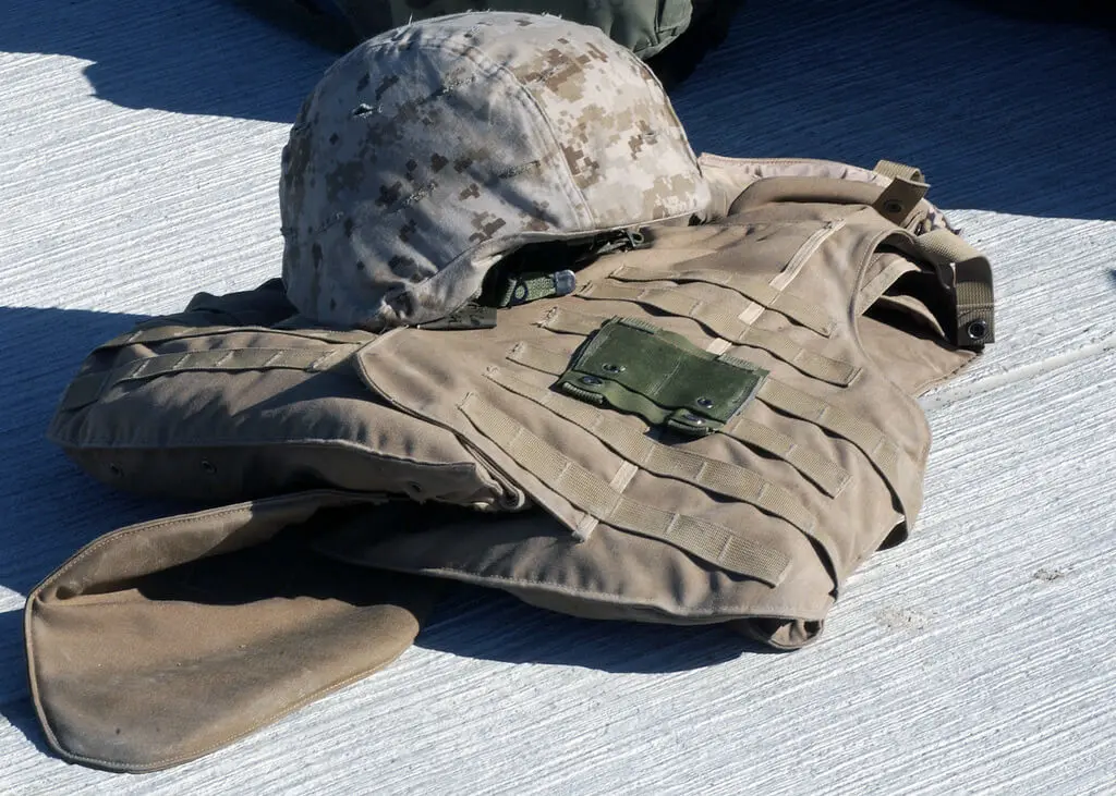 Women in Engineering History- A-photo-of-a-flack-jacket-and-kevlar-helmet-of-a-U.S.-Marine-Corps-Marine-1ST-Battalion-7th-Marine-Regiment-1ST-Marine-Division