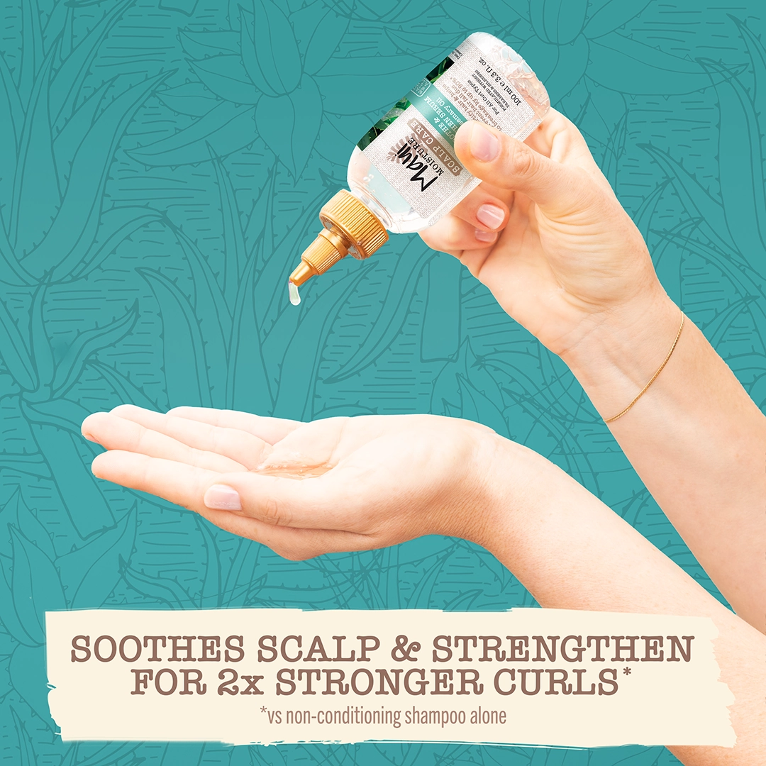 Scalp Care Soothe & Strengthen Serum with Rosemary Oil dripping product into hand